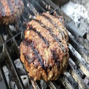 Learning how to grill a steak in a barbecue
